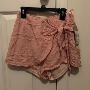 Cute pink shorts with tie from Lizard Thicket size small.